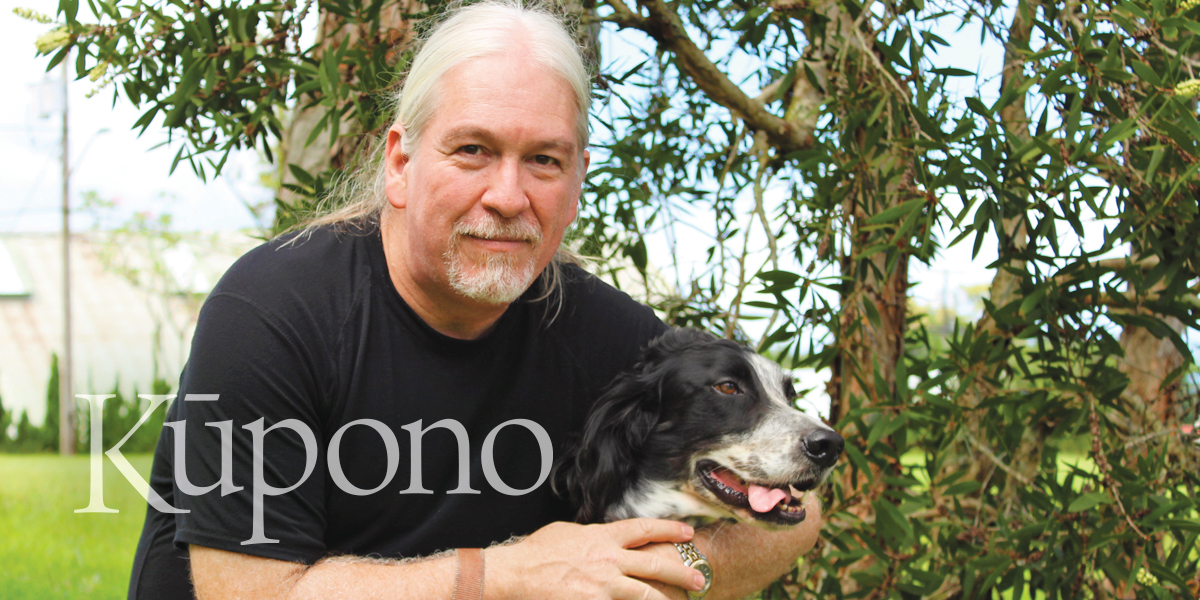 Kūpono Fall 2021 Issue cover: Professor Philippe Binder and his dog, Peppers