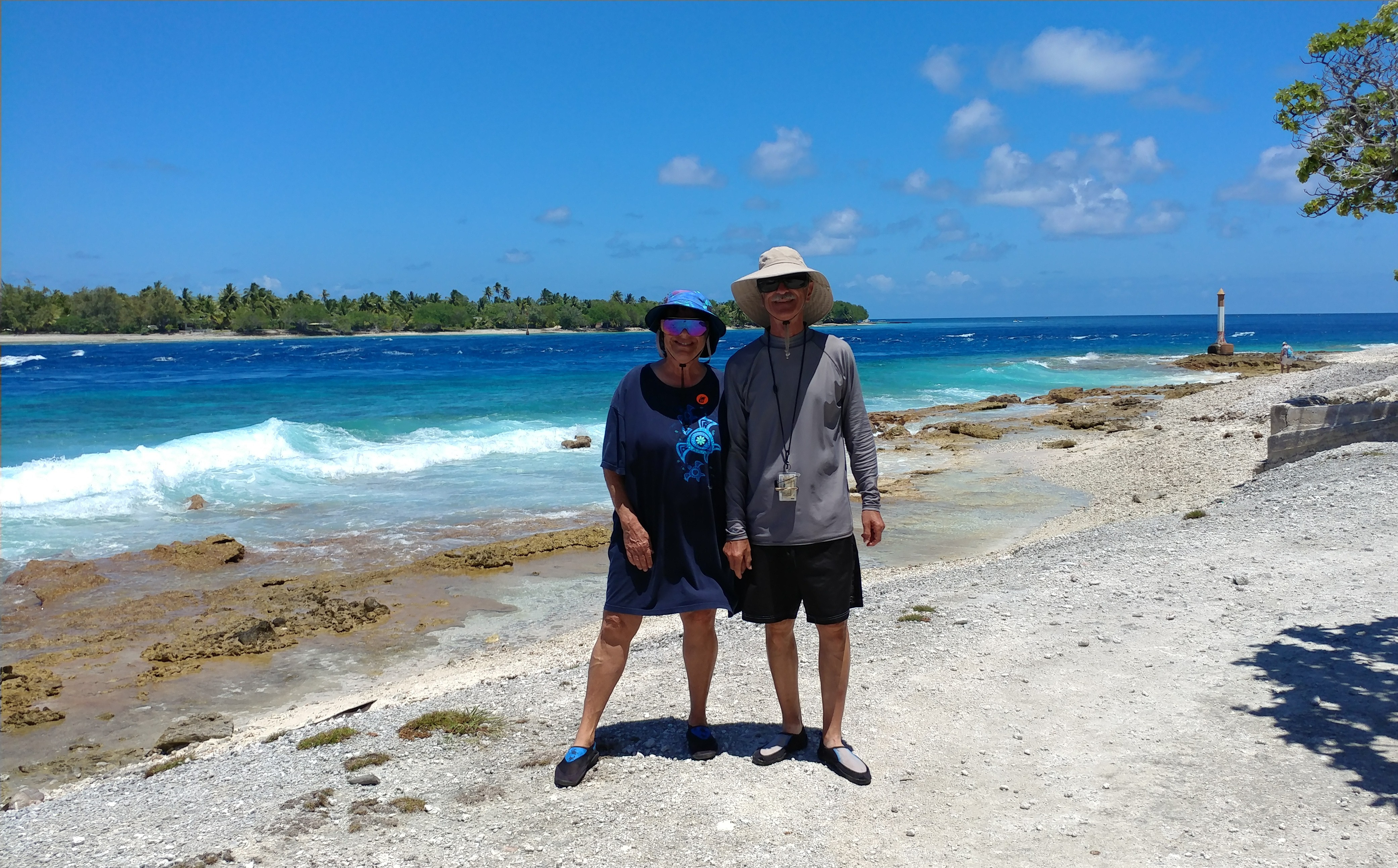 Fran and Kirk Alexander on a beach in Rangiroa in 2018