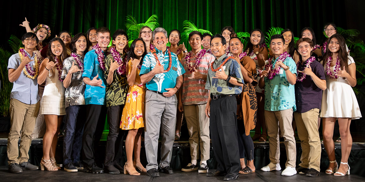 UH President David Lassner and UH Board of Regents Chair Benjamin Kudo with the 2019 Regents and Presidential Scholarship winners.
