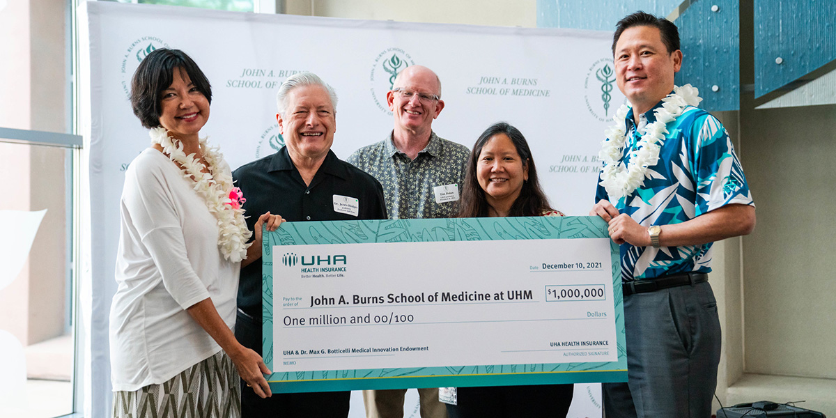 image of Ann Botticelli, Jerris Hedges, Tim Dolan, Jill Omori and Howard Lee holding a check from UHA