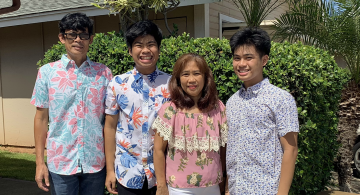 Daniel John Quiamas with his father, mother and brother.