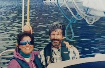 Fran and Kirk Alexander aboard their sailboat off the coast of North British Columbia