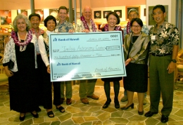Bank of Hawaiʻi presents 50,000 check to ʻImiloa Astronomy Center. Left to right are: Dr. Marlene Hapai, former executive director of ʻImiloa and UH Regent; Art Taniguchi, Vice-President of East Hawaiʻi Region at Bank of Hawaiʻi; Roberta Chu, Hawaiʻi Island Manager and Senior Vice President at Bank of Hawaiʻi; Al Landon, Bank of Hawaiʻi Chairman and CEO; Peter B. Giles, ʻImiloa Executive Director; Rose Tseng, Chancellor, UH-Hilo; Mayor Harry Kim; Donna Tanoue, Bank of Hawaiʻi Vice Chairman and President o